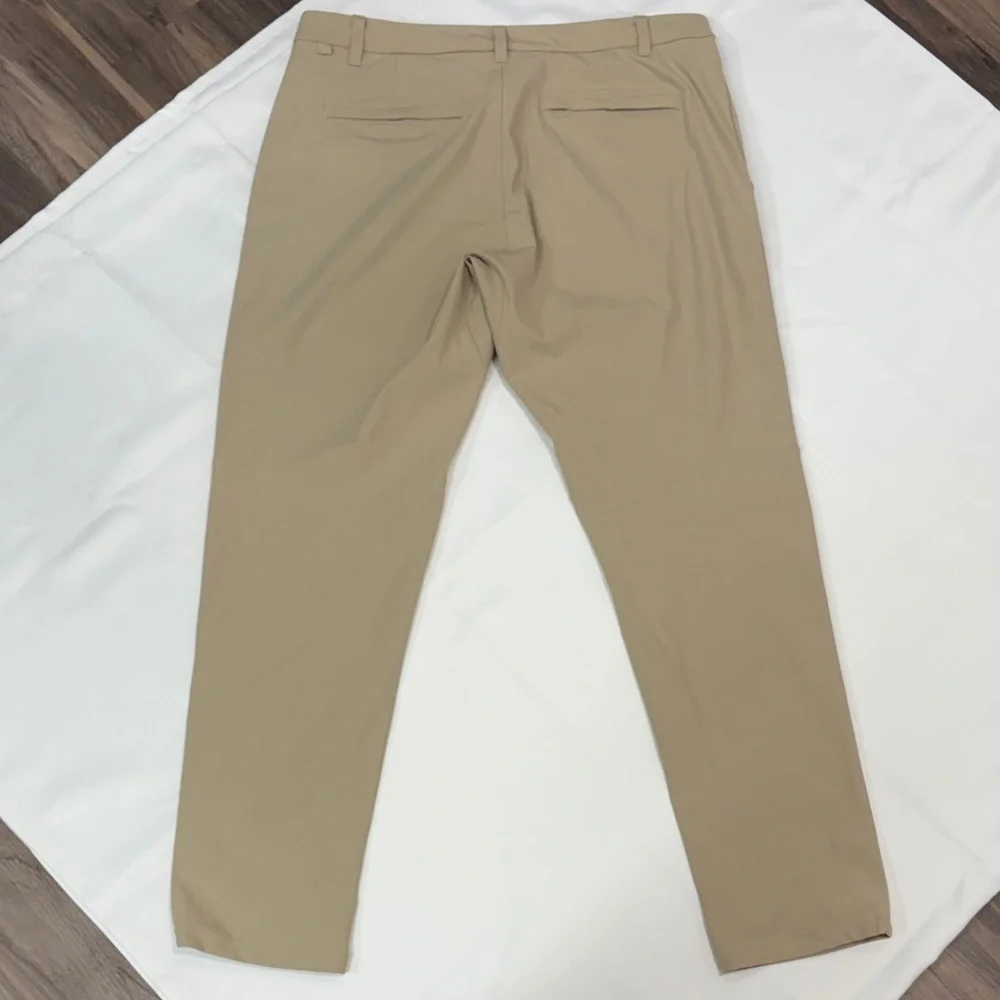 LULULEMON SLIM-FIT TROUSER SIZE 36 WARPSTREME.